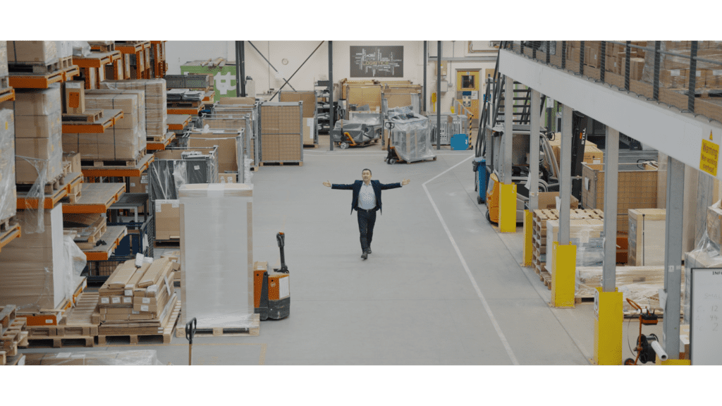 Man in warehouse, still Cornwall Chamber brand film