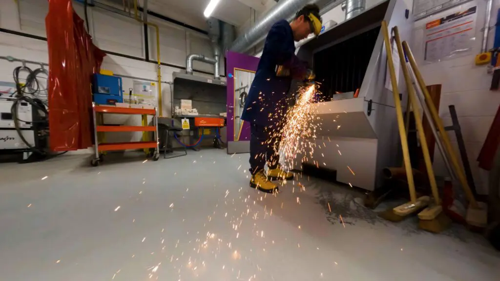 Man using angle grinder