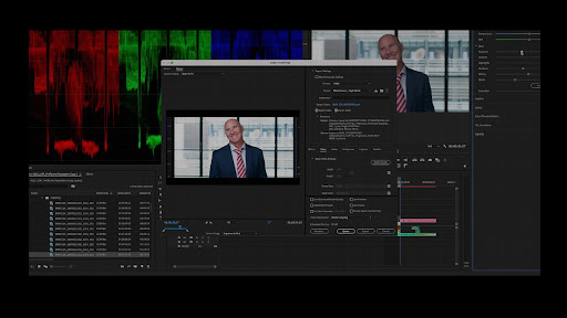 video editing on computer system pictured a man talking to the camera